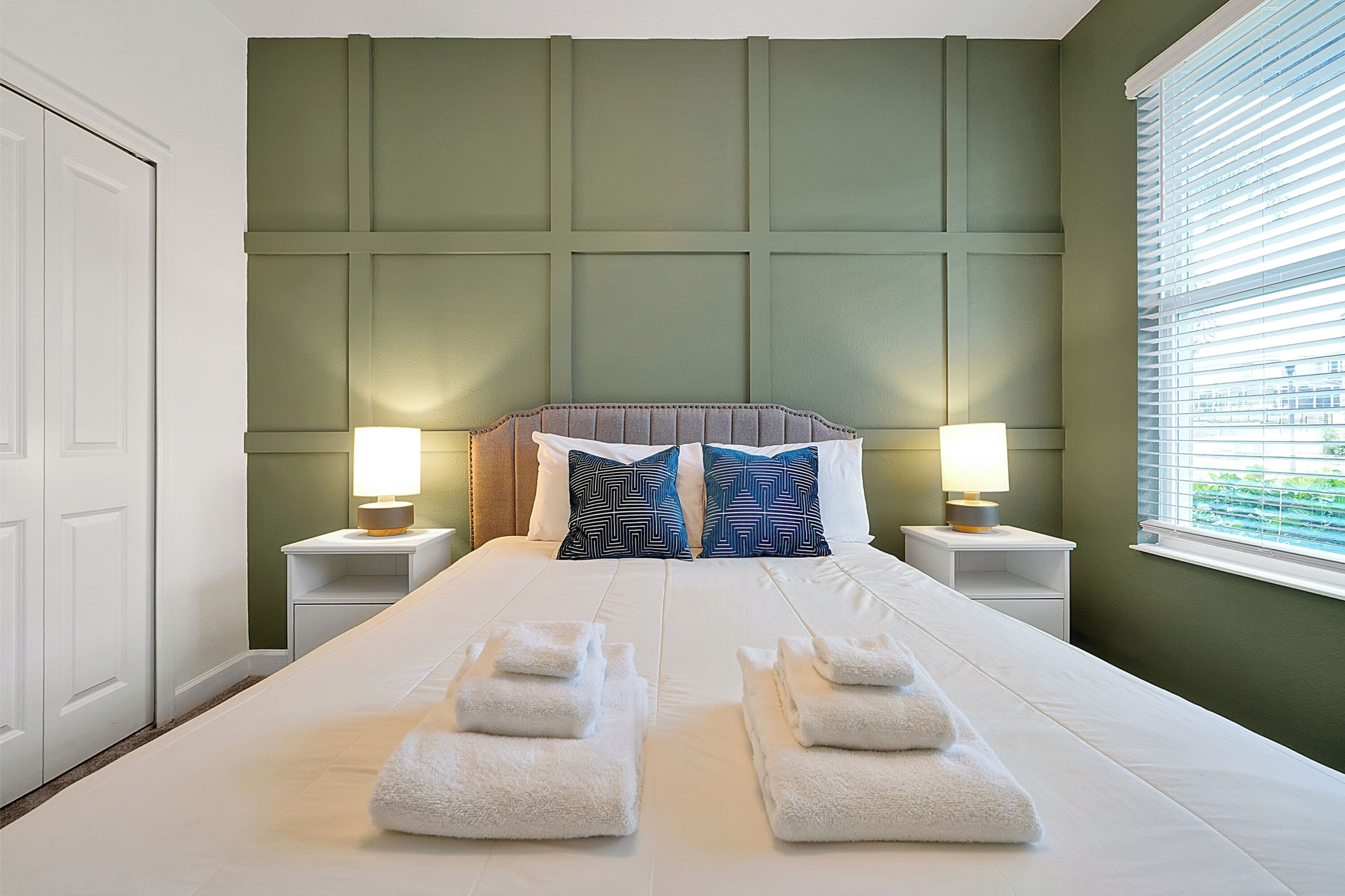 Bedroom 2 king green accent wall